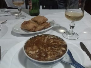 Hot and sour soup, spring rolls, Chinese food in Italy